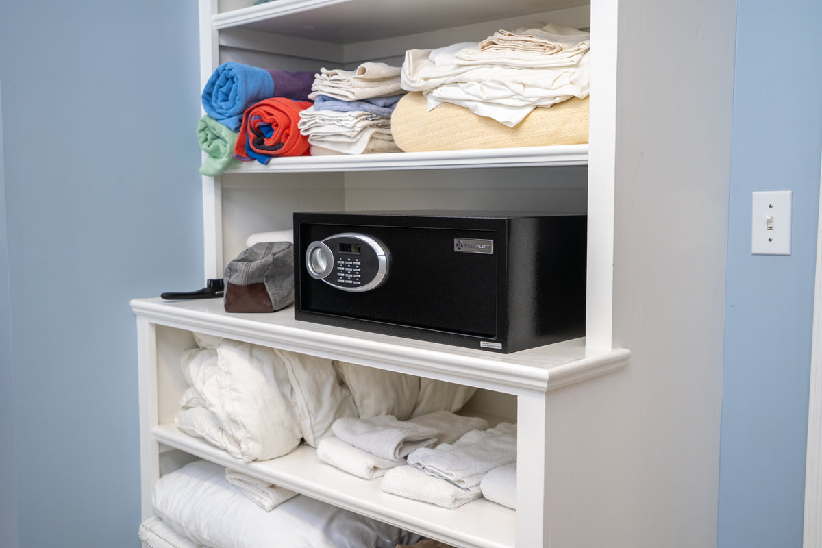 First Alert Steel Security Safe, 1.2 CU FT Features Digital Electronic Lock and  Emergency Access Override Key, Anti-Pry Hinges, Interior Lighting, Removable Shelf & Bolt Down Feature.  Model 4015DFB